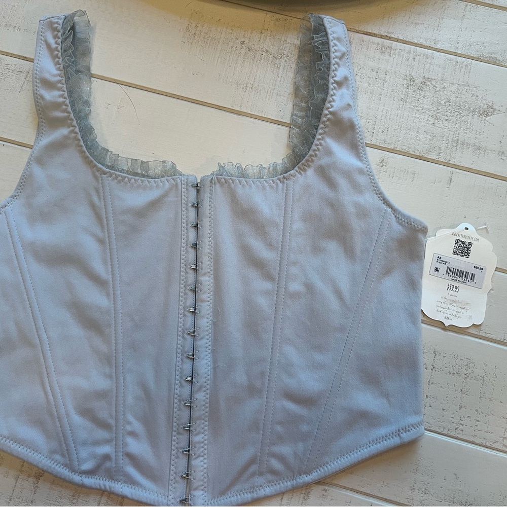 Altar’d State Light Blue Corset Top with ruffle trim. NWT!
